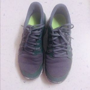 Army green Nike sneakers